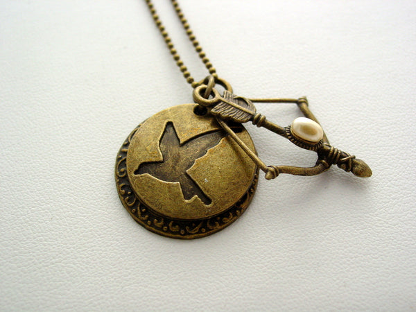 Hunger Games District 12 Antique Bronze Hidden Bow Necklace