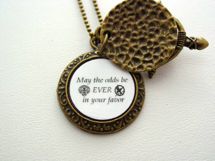 Hunger Games May The Odds Be Ever In Your Favor Mockingjay Hidden Necklace